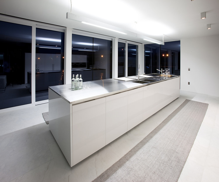 Ultra modern kitchen cabinets and minimalist island by bravo